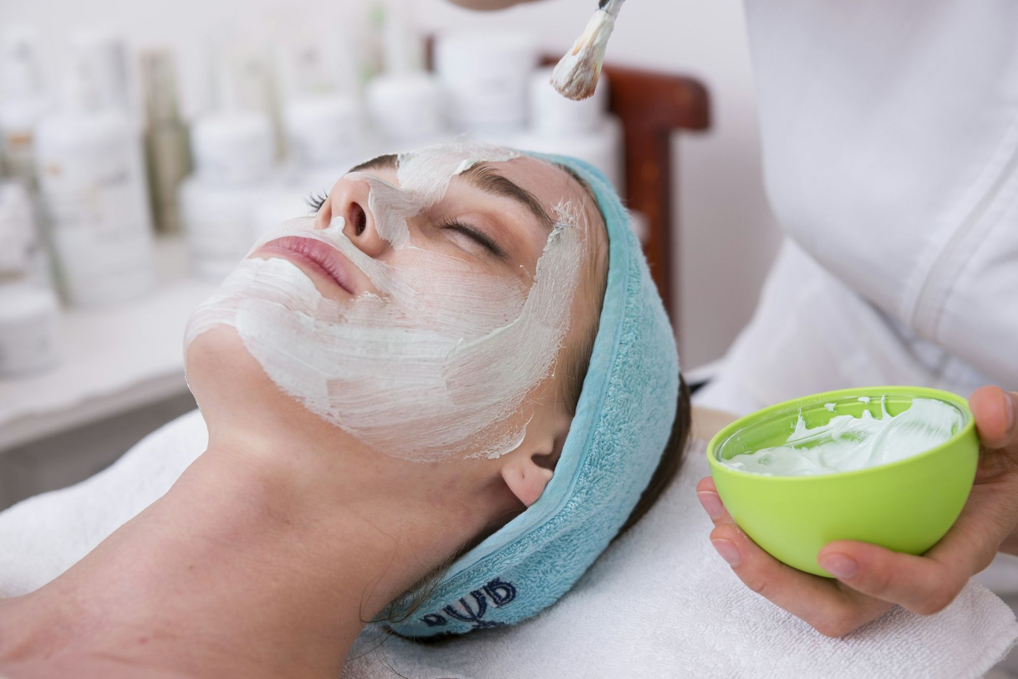 Client relaxing during a face mask treatment