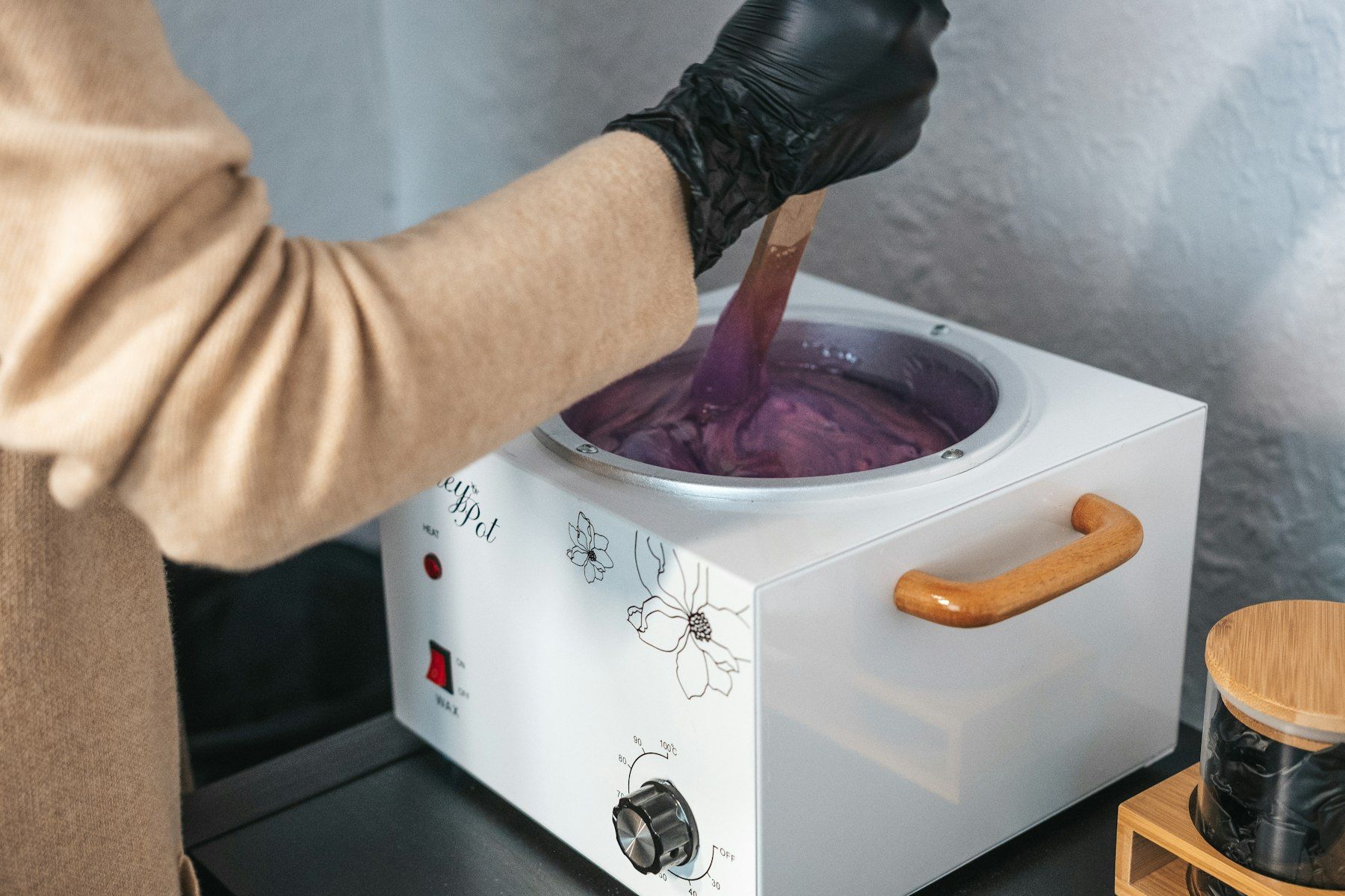 Hot wax being prepared in a heater